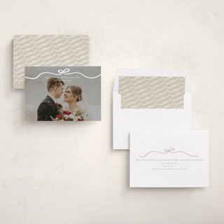 This is a snow holiday photo cards with standard by Kaydi Bishop called bow tied printing on recycled smooth signature in standard