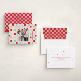 This is a cranberry holiday photo cards with standard by Katie Zimpel called happy checkers printing on recycled smooth signature in standard