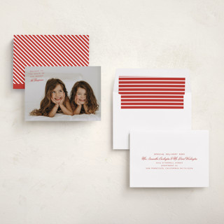 This is a cranberry holiday photo cards with standard by Heather Schertzer called believe printing on recycled smooth signature in standard