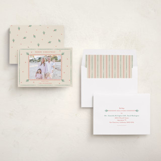 This is a holly holiday photo cards with standard by Sarah Rosenthal called holly tidings printing on recycled smooth signature in standard