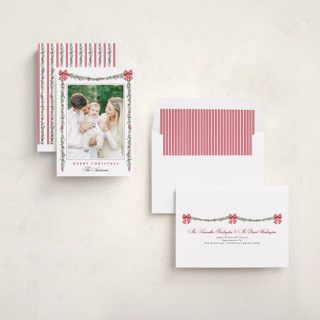 This is a candy cane holiday photo cards with standard by Susan Moyal called holly & bows printing on recycled smooth signature in standard