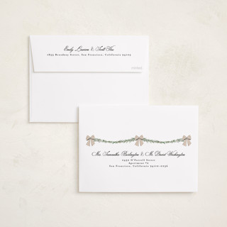 This is a coal holiday photo cards with standard by Susan Moyal called holly & bows printing on recycled smooth signature in standard