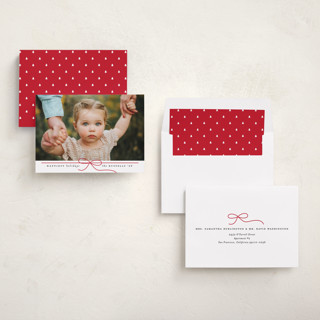 This is a poinsettia holiday photo cards with standard by Erica Krystek called petite bow printing on recycled smooth signature in standard