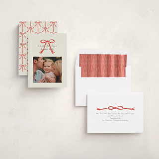 This is a peppermint holiday photo cards with standard by Laura Hankins called painted bow printing on recycled smooth signature in standard