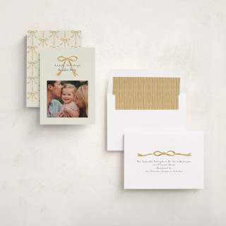 This is a caramel holiday photo cards with standard by Laura Hankins called painted bow printing on recycled smooth signature in standard