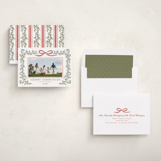 This is a holly berry holiday photo cards with standard by Wildfield Paper Co called laurel wreath printing on recycled smooth signature in standard