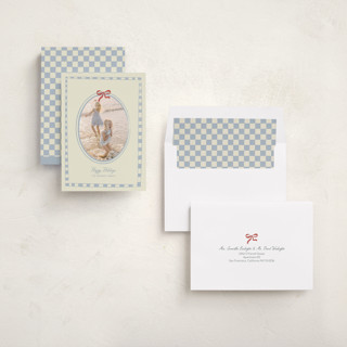 This is a celestial holiday photo cards with standard by Helena Vitto called little bow printing on recycled smooth signature in standard