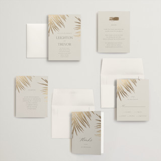 This is a sand petite wedding invitations with foil pressed by Melinda Denison called gilded palm printing on signature in petite