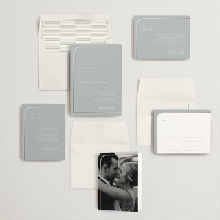 This is a dusty blue foil stamped wedding invitations with foil pressed by Carolyn Nicks called tuxedo printing on signature in standard