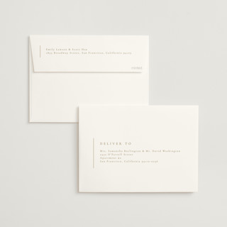 This is a golden foil stamped wedding invitations with foil pressed by Kelly Schmidt called golden ampersand printing on signature in standard