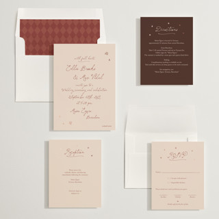 This is a terracotta sunset foil stamped wedding invitations with foil pressed by Ani Somi called written in the stars printing on signature in standard