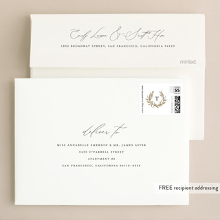 This is a cotton foil stamped wedding invitations with foil pressed by Stacey Meacham called laurel monogram printing on signature in standard