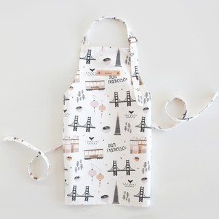 This is a violet kids aprons by Kristie Kern called san francisco in standard