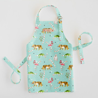 This is a frozen pond kids aprons by Michelle Shanaman called wild and sweet christmas in standard