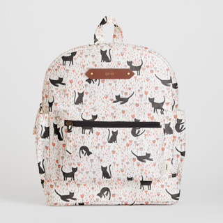 This is a black kitty backpacks by Betsy Siber called meadow cats in lower case