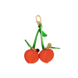 This is a red back to school supplies by Jollity and Co called cherry bag charms in standard
