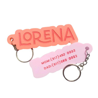 This is a multicolorassorted-colors back to school supplies by Haven Print Co. called custom name keychain in standard