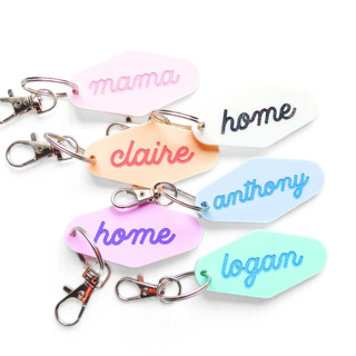 This is a multicolorassorted-colors back to school supplies by Haven Print Co. called custom name hotel keychain in standard