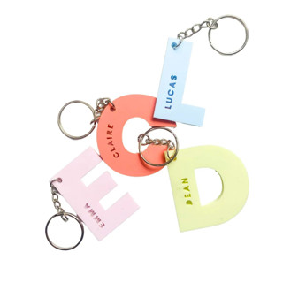 This is a multicolorassorted-colors back to school supplies by Haven Print Co. called monogram letter keychain in standard
