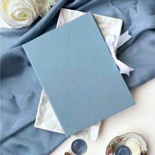This is a blue wedding gifts by Self Stationery called linen matted folio for 5x7 cards - dusty blue, wedding photo folio, keepsake in standard