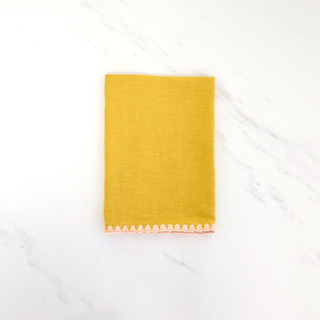 This is a yellow tea towels by Tina Huang called 100% organic french linen mustard embroidered tea towel in standard