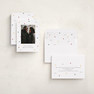 This is a snow kwanzaa cards with standard by Jessica Corliss called kwanzaa confetti printing on recycled smooth signature in standard