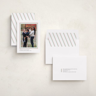 This is a frost kwanzaa cards with standard by Liz Conley called triple frame printing on recycled smooth signature in standard