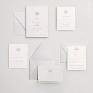 This is a dove grey letterpress wedding invitations with letterpress by Hannah Bowman called simple seashell printing on somerset500 in standard