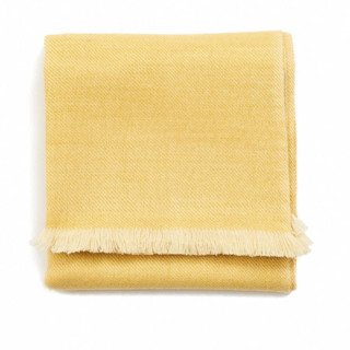 This is a yellow throw blankets by Anjali Purohit called dandelion merino throw in standard