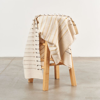 This is a white throw blankets by Anjali Purohit called safari merino throw in standard