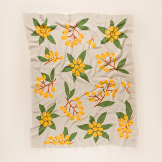 This is a yellow throw blankets by Superstitchous called loquat throw blanket in standard