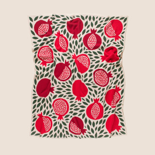 This is a red throw blankets by Superstitchous called pomegranate throw blanket in standard