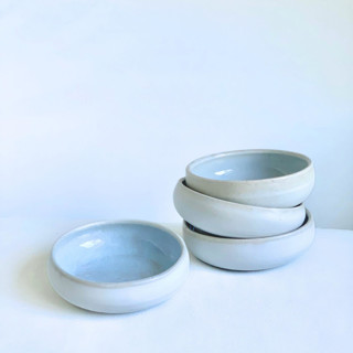 This is a white tableware by Cloude Made called Lagoon Bowls Set of 2.