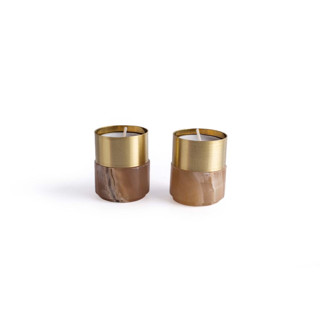 This is a bronze candles and candle holders by Powered By People called elegant brass candle holder with amber alabaster finish in standard
