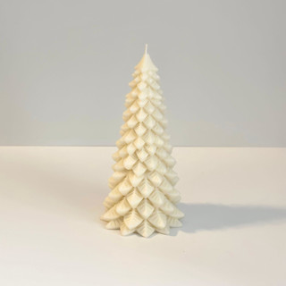 This is a white candles and candle holders by Over By The Moon called medium white christmas tree candle in standard