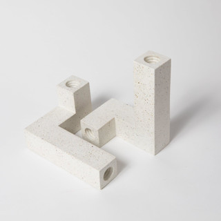 This is a white candles and candle holders by Pretti.Cool called candlestick holder set: white terrazzo in standard