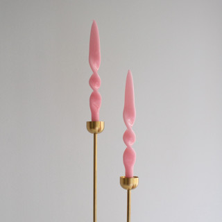 This is a pink candles and candle holders by the parmatile shop called taper candle set (pink) in standard