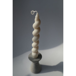This is a natural candles and candle holders by Powered By People called set of 2 twisted tapers in standard