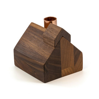 This is a brown candles and candle holders by Ann Nygard called schoolhouse little wooden house candlestick holder in standard