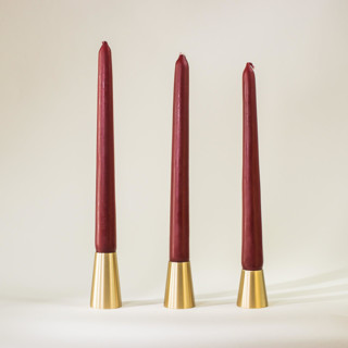 This is a brass candles and candle holders by Roarcraft called conical candlestick - set of 3 in standard
