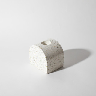 This is a white candles and candle holders by Pretti.Cool called white terrazzo block candlestick holder, arch in standard