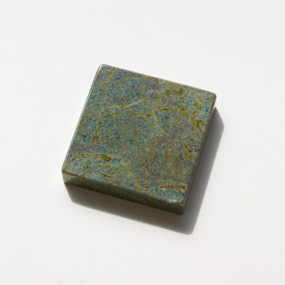 This is a green decorative objects by the parmatile shop called marble pedestal (rainforest) in standard