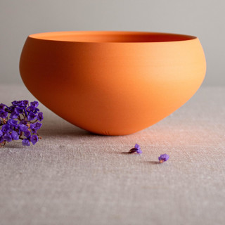 This is a orange decorative objects by Lisa Fleming called orange porcelain vessel 7 in standard