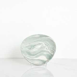 This is a green decorative objects by Tina Huang called clamshell catchall tray - celadon in standard
