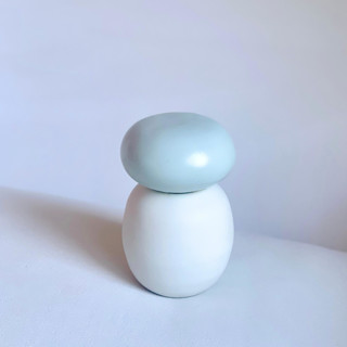 This is a white decorative objects by Cloude Made called pebble oval jar in standard