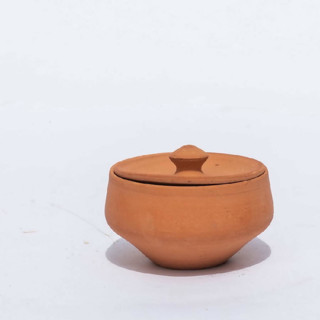 This is a natural decorative objects by Powered By People called artisanal small terracotta pot with lid in standard