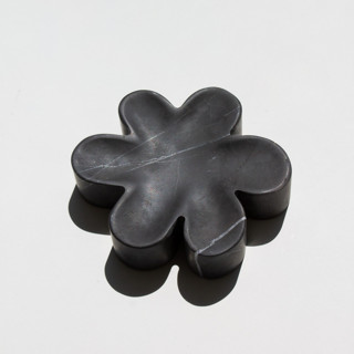 This is a black decorative objects by the parmatile shop called the parmatile shop x notte superbloom catch all in standard