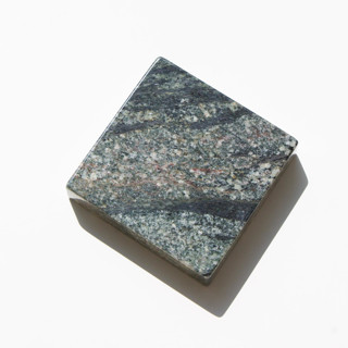 This is a green decorative objects by the parmatile shop called marble pedestal (mandacaru green) in standard