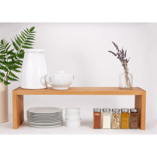 This is a natural accent pieces by Reds Wood Design called medium oak kitchen shelf riser in standard