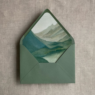 This is a green wedding envelopes by Ivory Invitations called abstract painting green mountain envelope liner for a7 euro flap envelope in standard